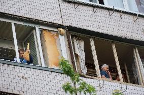 Shopping center, supermarket and residential building damaged by shelling in Kyiv