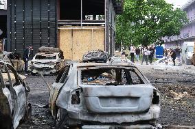 Shopping center, supermarket and residential building damaged by shelling in Kyiv