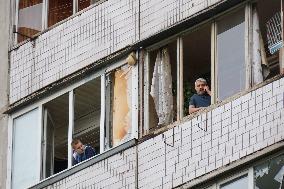 Shopping center, supermarket and residential building damaged by shelling in Kyiv