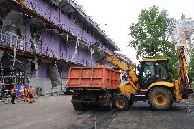 Shopping center, supermarket and residential building damaged by shelling in Kyiv