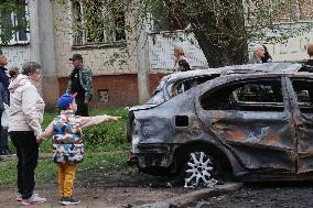 Shopping center, supermarket and residential building damaged by shelling in Kyiv
