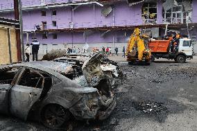 Shopping center, supermarket and residential building damaged by shelling in Kyiv