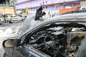 Shopping center, supermarket and residential building damaged by shelling in Kyiv