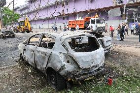 Shopping center, supermarket and residential building damaged by shelling in Kyiv