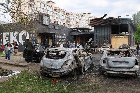 Shopping center, supermarket and residential building damaged by shelling in Kyiv