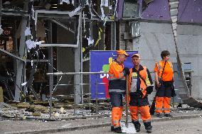 Shopping center, supermarket and residential building damaged by shelling in Kyiv