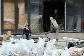 Shopping center, supermarket and residential building damaged by shelling in Kyiv