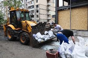 Shopping center, supermarket and residential building damaged by shelling in Kyiv