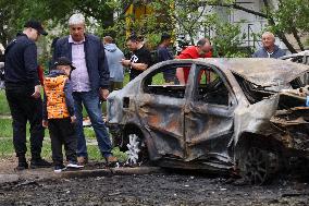 Shopping center, supermarket and residential building damaged by shelling in Kyiv
