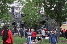 Shopping center, supermarket and residential building damaged by shelling in Kyiv