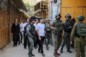 Israeli Forces Escort Settlers - Hebron