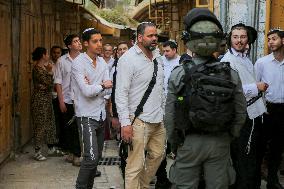 Israeli Forces Escort Settlers - Hebron