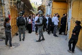 Israeli Forces Escort Settlers - Hebron