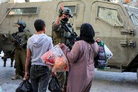 Israeli Forces Escort Settlers - Hebron