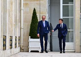 Macron and Merz Discuss in Elysee Garden - Paris