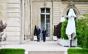 Macron and Merz Discuss in Elysee Garden - Paris