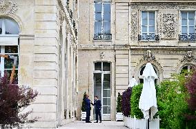 Macron and Merz Discuss in Elysee Garden - Paris