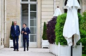 Macron and Merz Discuss in Elysee Garden - Paris