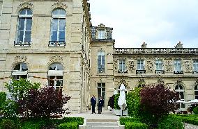 Macron and Merz Discuss in Elysee Garden - Paris