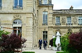 Macron and Merz Discuss in Elysee Garden - Paris