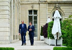 Macron and Merz Discuss in Elysee Garden - Paris
