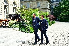 Macron and Merz Discuss in Elysee Garden - Paris