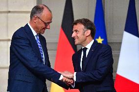 Macron and Merz Hold Joint Press Conference at Elysee - Paris