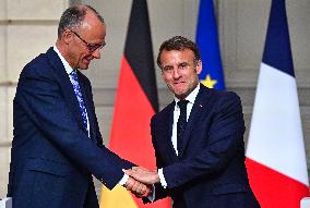 Macron and Merz Hold Joint Press Conference at Elysee - Paris