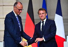 Macron and Merz Hold Joint Press Conference at Elysee - Paris