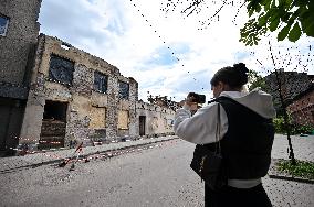 Building damaged by Russian attack gets dismantled in Lviv