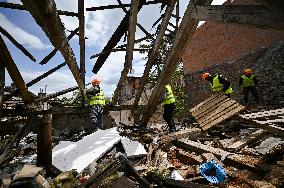 Building damaged by Russian attack gets dismantled in Lviv