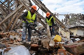 Building damaged by Russian attack gets dismantled in Lviv