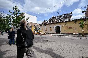 Building damaged by Russian attack gets dismantled in Lviv