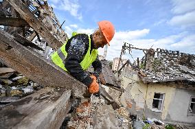 Building damaged by Russian attack gets dismantled in Lviv