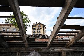 Building damaged by Russian attack gets dismantled in Lviv