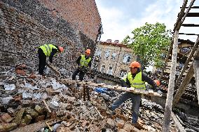 Building damaged by Russian attack gets dismantled in Lviv