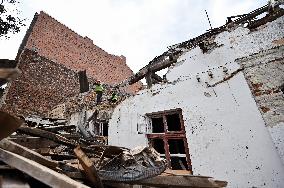 Building damaged by Russian attack gets dismantled in Lviv