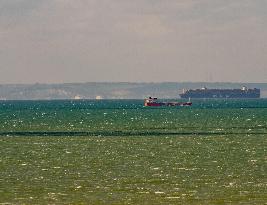 Container Ship Meets Ferry in the English Channel - France