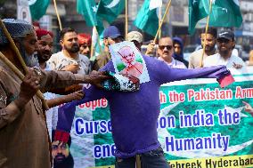 Rally Condemns Airstrikes - Pakistan