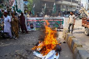 Rally Condemns Airstrikes - Pakistan