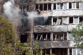 Kyiv apartment block damaged by Russian drone debris