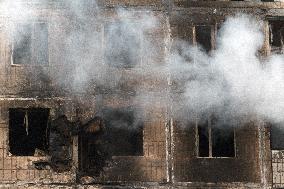Kyiv apartment block damaged by Russian drone debris