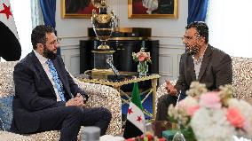 Ahmed Al-Sharaa Meets Syrian Photographer Known as Caesar - Paris
