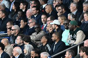 DJ Snake, Omar Sy And Tony Parker At PSG v Arsenal - Paris