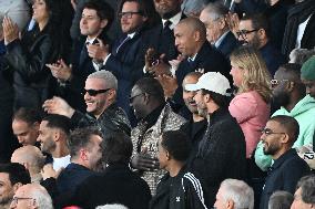 DJ Snake, Omar Sy And Tony Parker At PSG v Arsenal - Paris