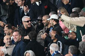 DJ Snake, Omar Sy And Tony Parker At PSG v Arsenal - Paris