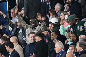 DJ Snake, Omar Sy And Tony Parker At PSG v Arsenal - Paris