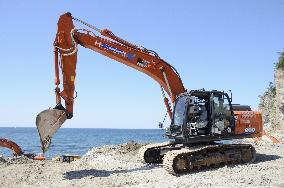 Remotely controlled excavator