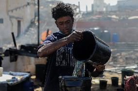 Palestinians Turn Plastic Waste into Fuel to Survive - Gaza