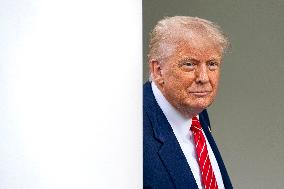 President Donald Trump Speaks with Reporters Outside Oval